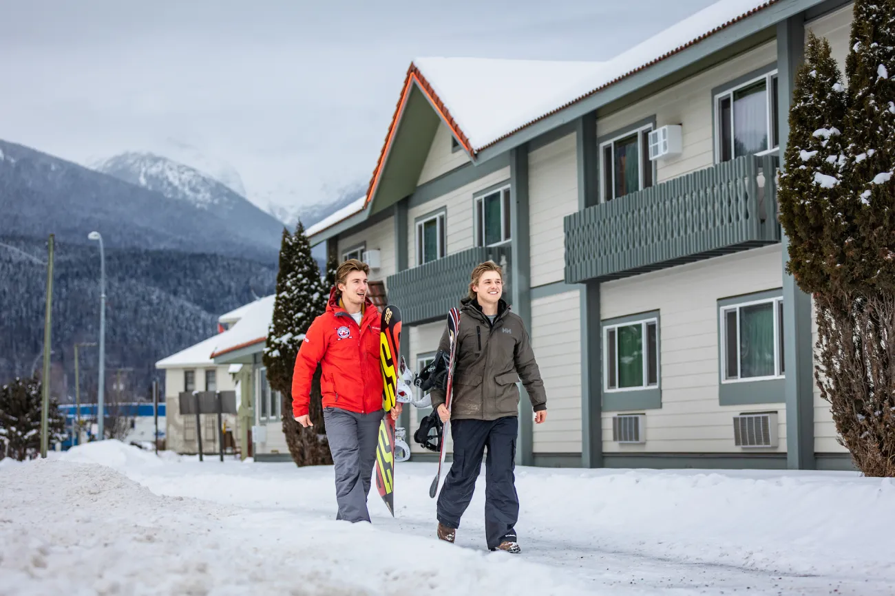 Smithers BC snowboarders walking in town